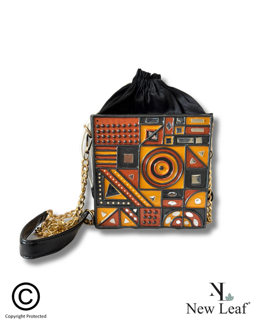 Gilded Mirage – Black Gold Lippan Handcrafted Potli