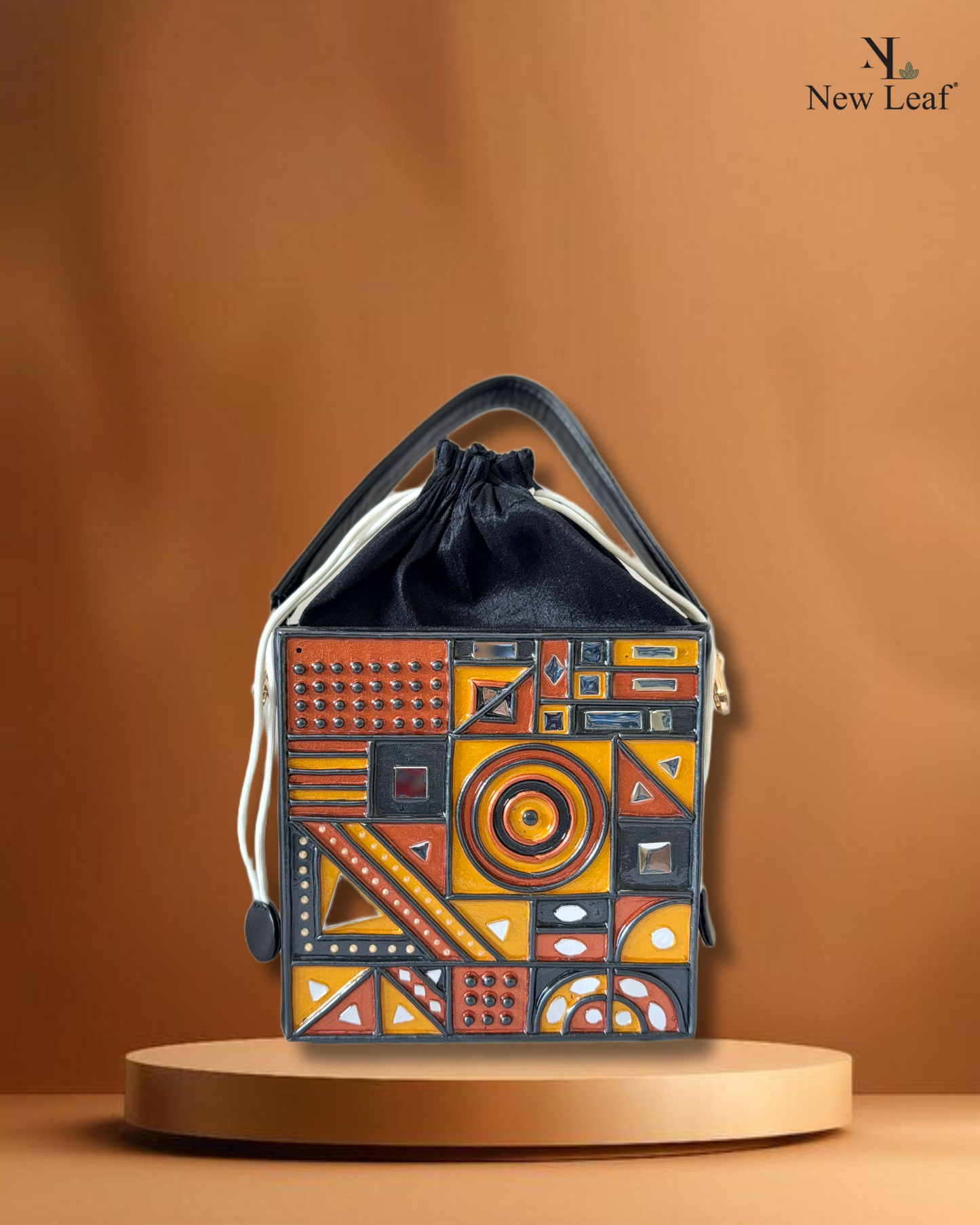 Gilded Mirage – Black Gold Lippan Handcrafted Potli