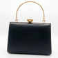 Black Trapezium Clutch Sling – Plain Handcrafted Bag