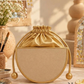 New Leaf Golden Semi-Circle Potli Sling – Plain Handcrafted Bag
