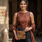 Gilded Mirage – Black Gold Lippan Handcrafted Potli